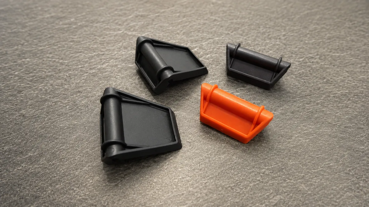 Kantenschutz-Clips aus Kunststoff in Schwarz und Orange
